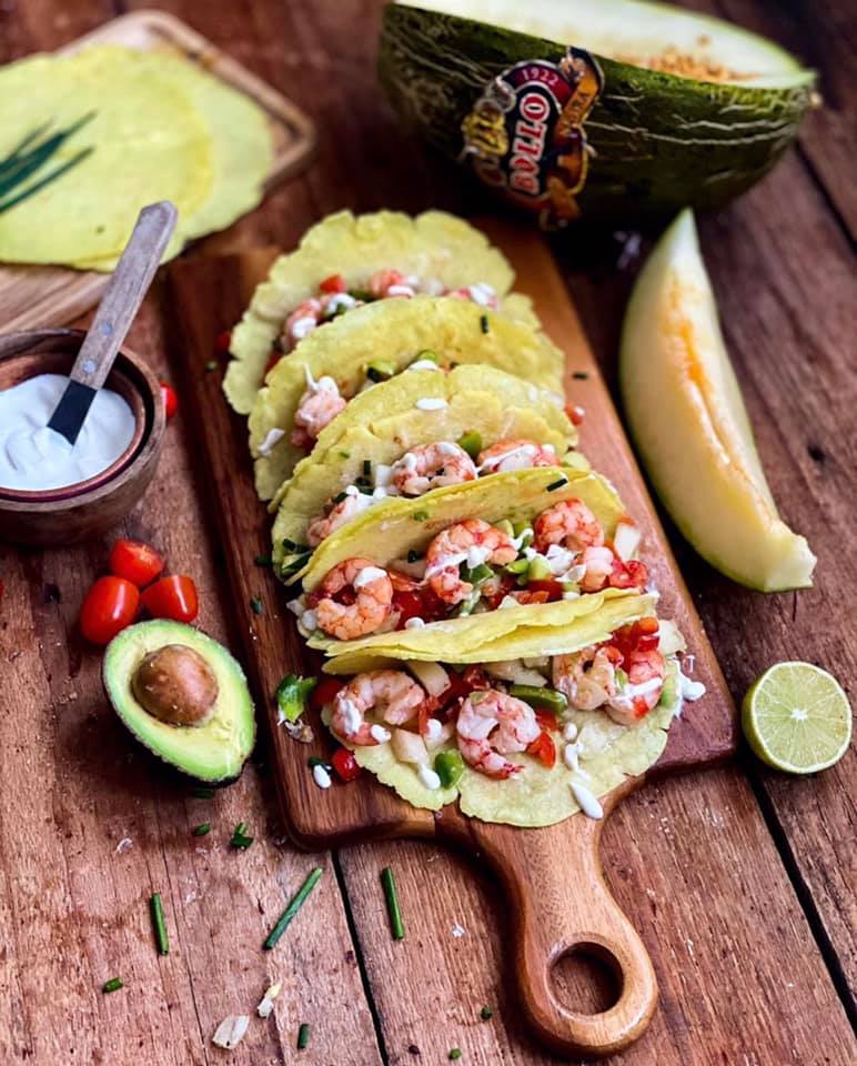 Homemade tacos with prawn and melon filling